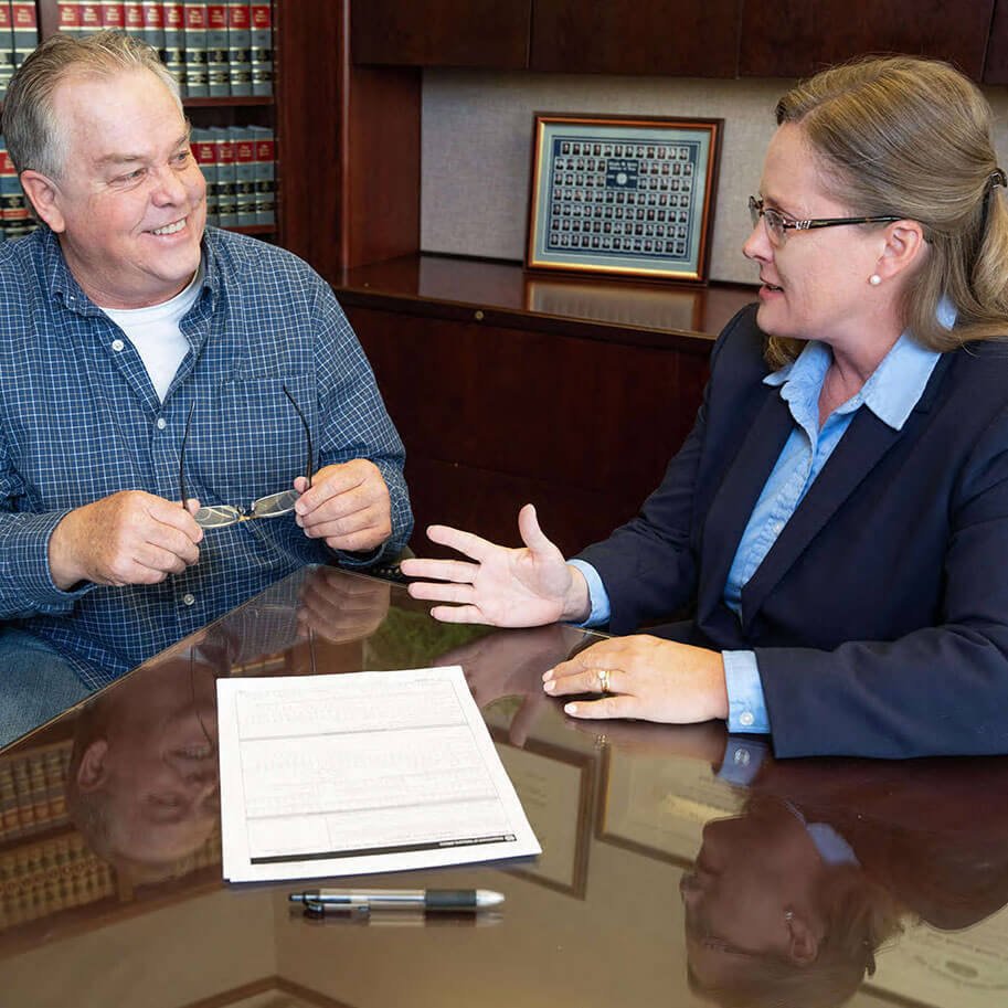 Attorney Stephanie Dobson meets with veterans’ disability client Joseph Kendall.