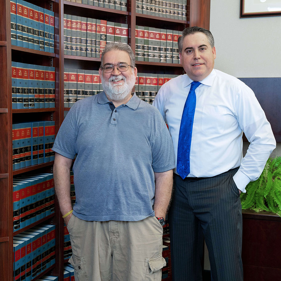 Attorney Fred Sommer, right, with HNB personal injury client Jeffrey Thompson in the HNB offices. Our team handles the legwork of your legal claim and treats you with respect.