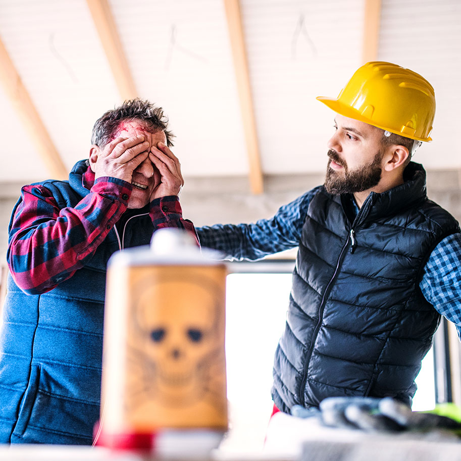 A construction worker puts his hand on the shoulder of another worker who’s covering his eyes in pain. After an injury on the job, Horenstein, Nicholson & Blumenthal lawyers help you through the workers’ compensation process.