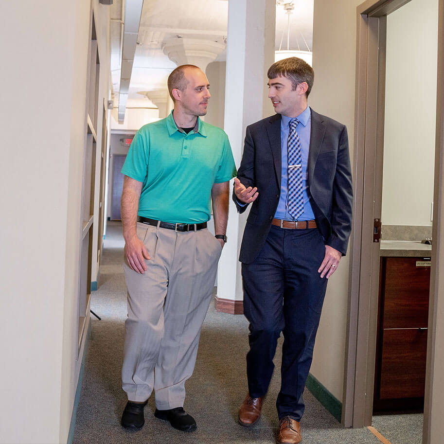 HNB visitor Jacob Loeffelholz talks with attorney Rob Walter in the HNB offices. Our lawyers work hard to make your experience with the legal system easier.